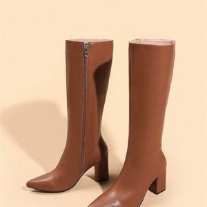 Brown heels boot . Great for this season .